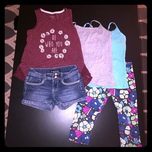 3 tanks, 1 pair of shorts and 1 pair of leggings